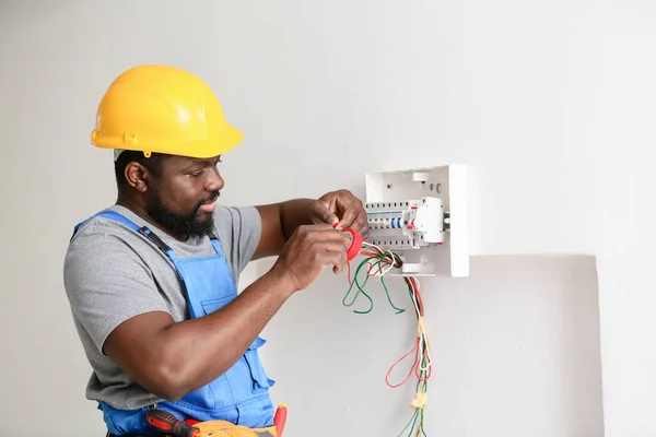 Technician repairing laundry equipment